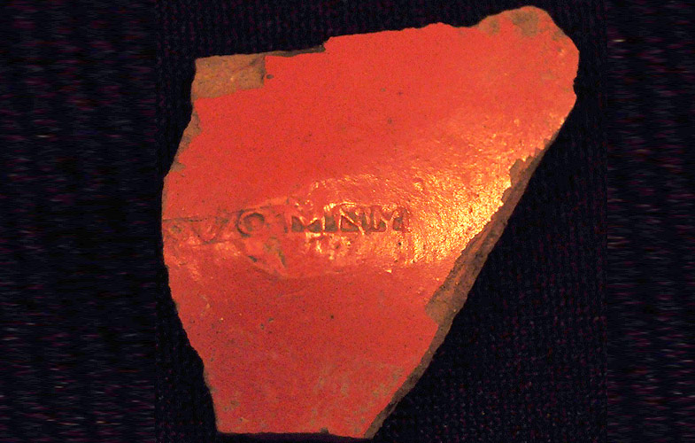 High Status Roman pottery known as Samian Ware complete with makers mark. 