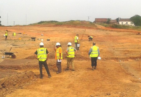 Area being cleared of archaeology prior to sat bulldozers beginning cut and fill works