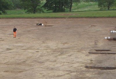 Strip, map and sample excavation over the site to record the surviving archaeological evidence